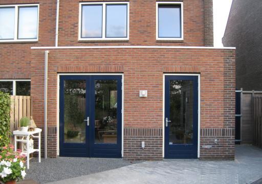 aanbouw van een woonhuis