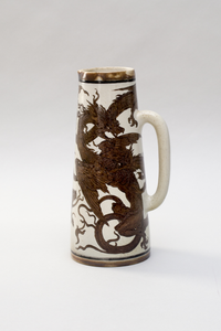 Photograph: Stoneware water jug with incised dragons, 1894 by the Martin Brothers.