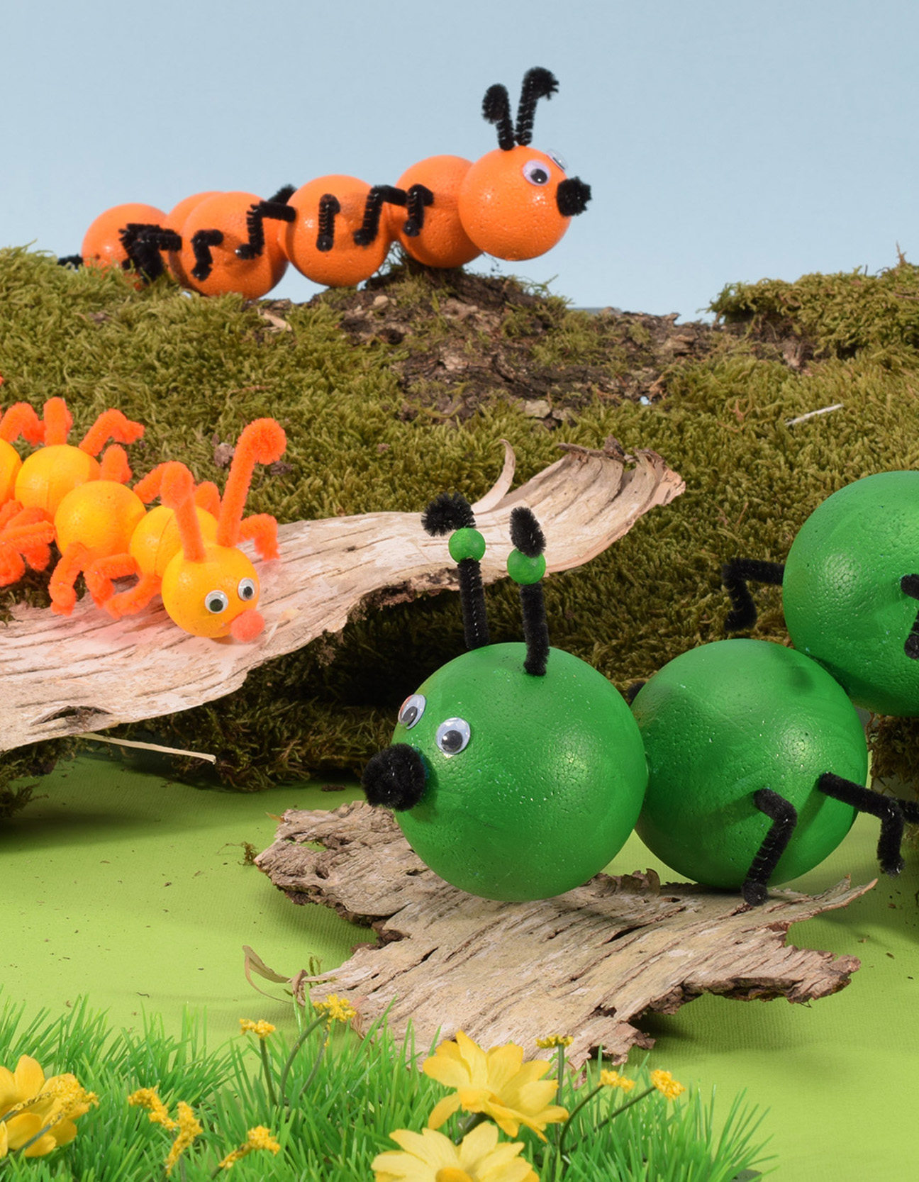 Finished foam ball caterpillars with colourful paint, chenille wire legs and googly eyes
