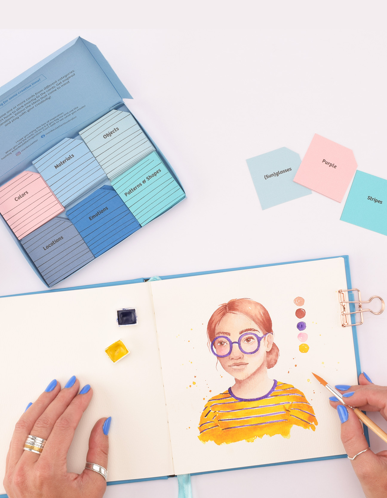 Boîte DIY terminée avec cartes d’inspiration et illustration créative