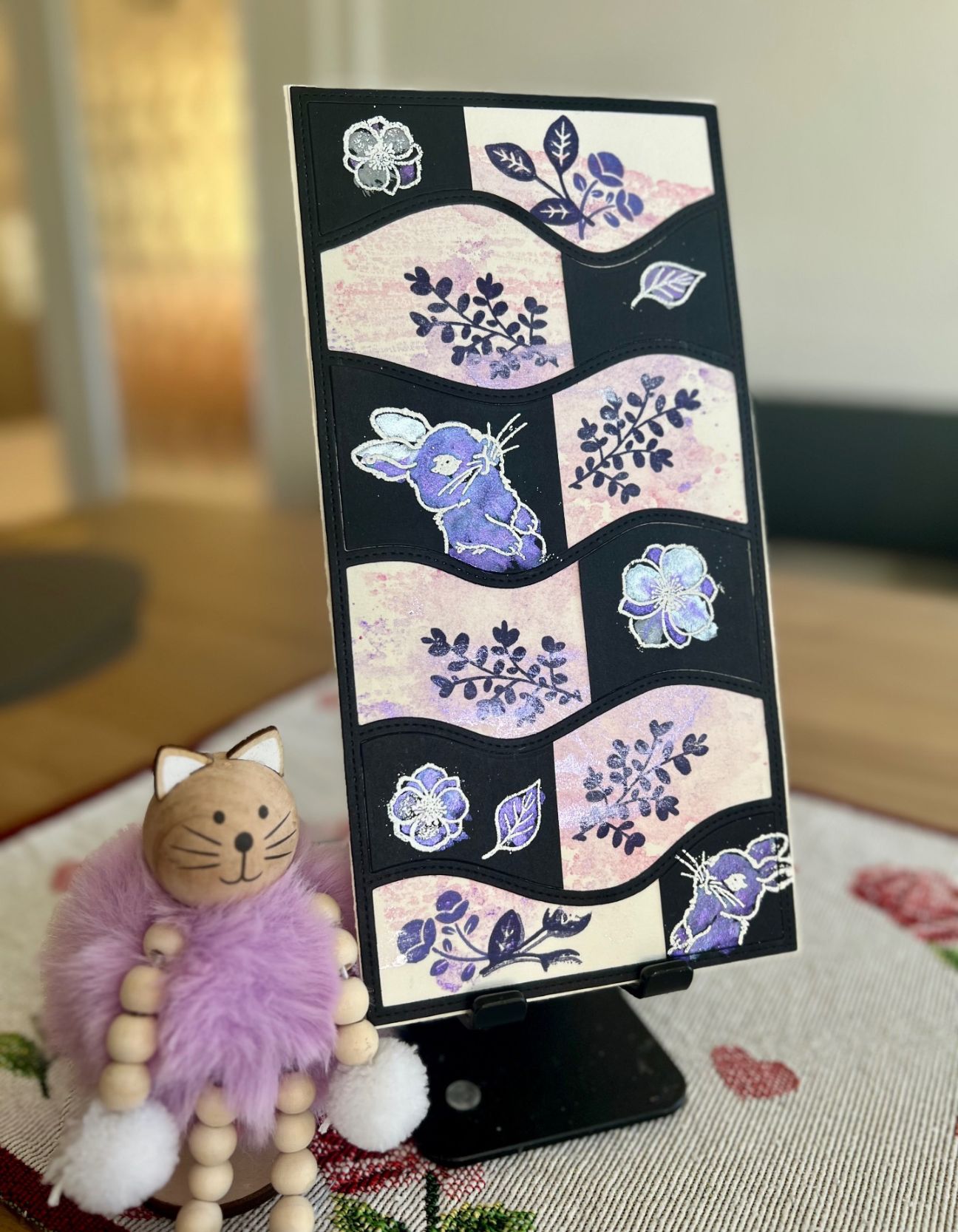 Handmade card with soft Gel Press backgrounds, stamped leaves, flowers and a rabbit design