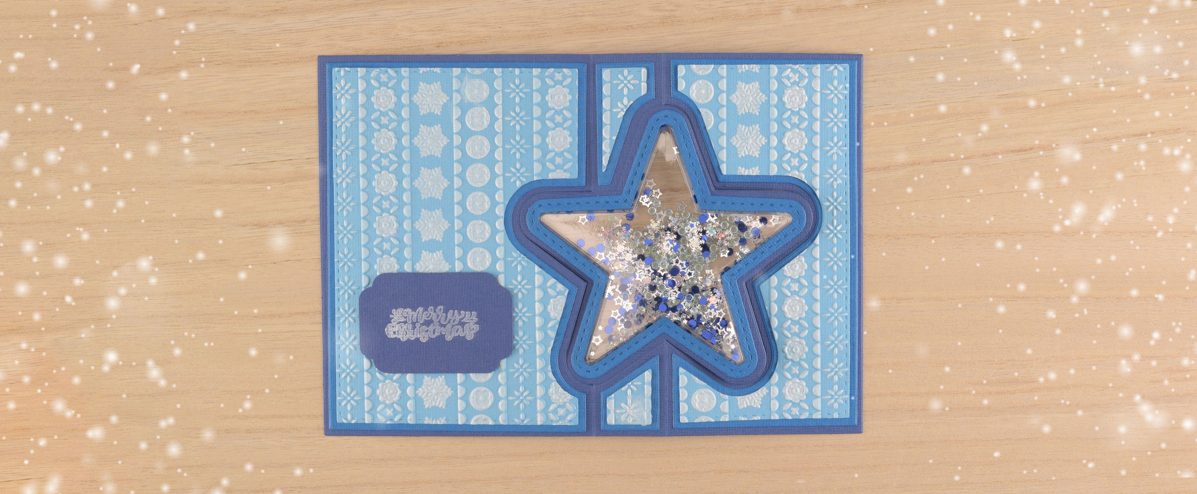 Ster shaker kerstkaart — transparante kaart met glitters en bewegende sterretjes.