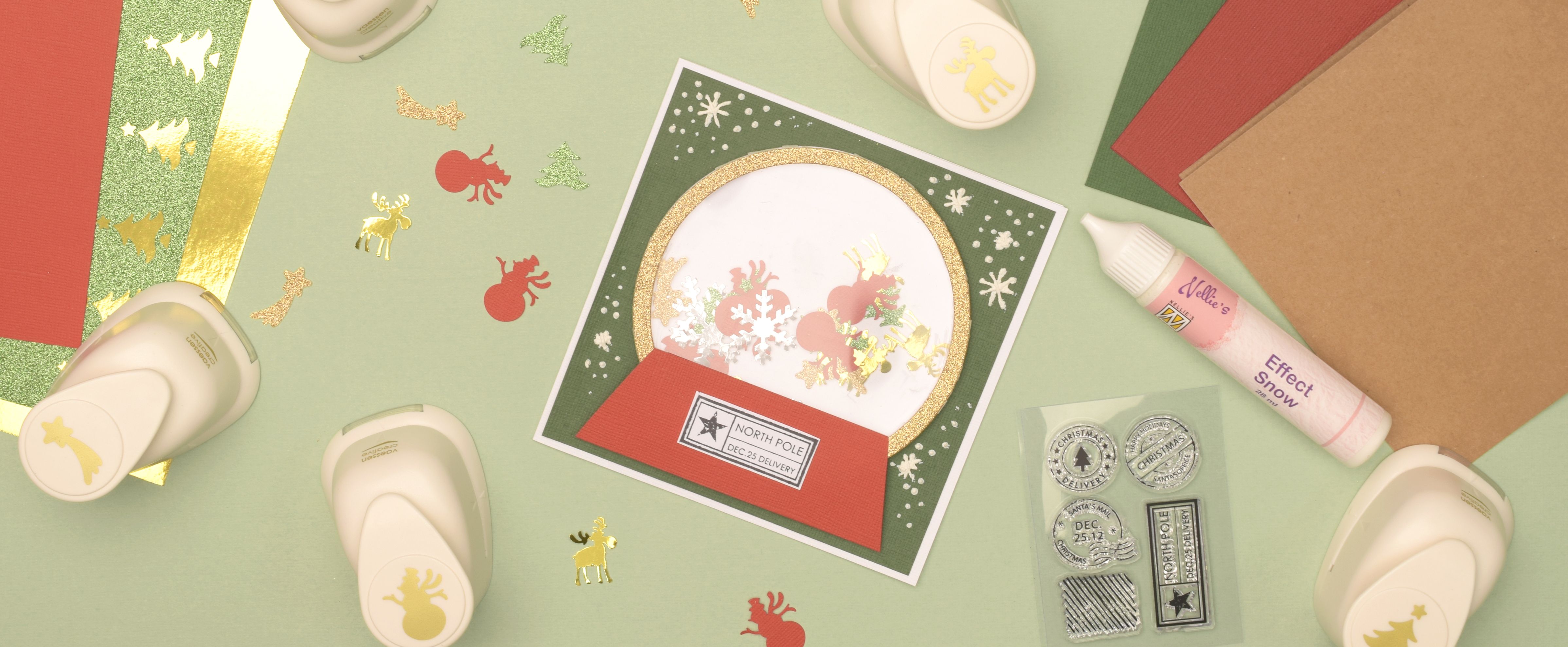 Sneeuwbol kerstkaart maken — handgemaakte kerstkaart met 3D bol en sneeuw.