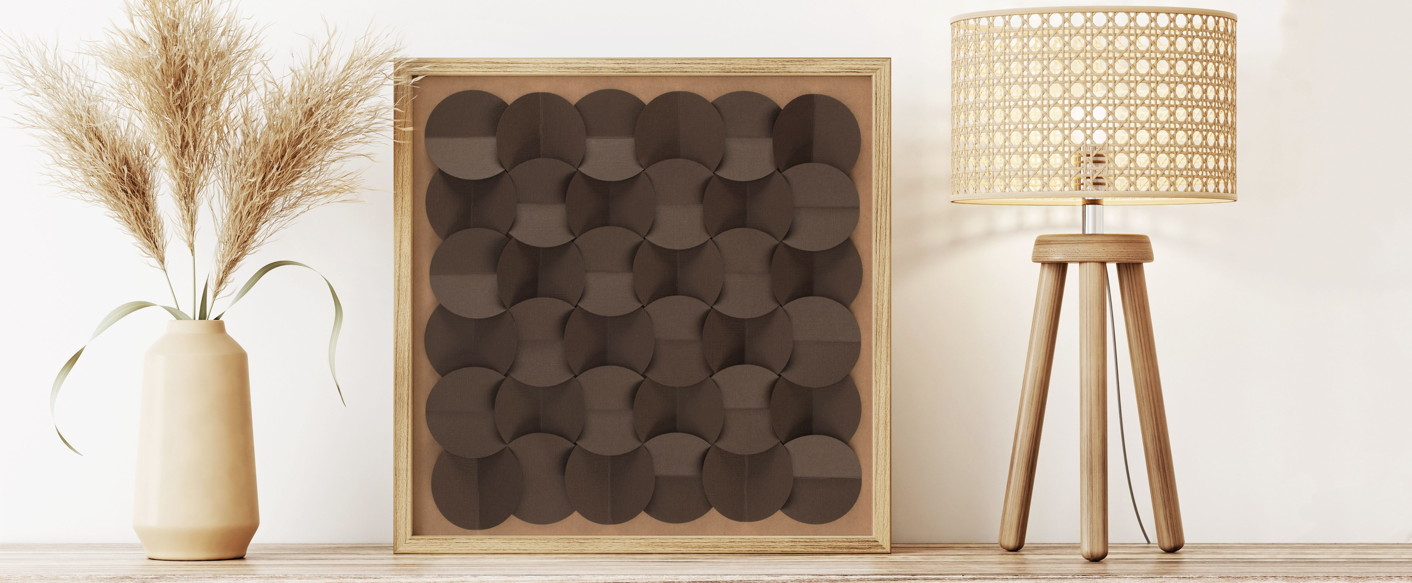 Moderne 3D wall art met papieren cirkels in lijst – stijlvol DIY kunstwerk ideaal als Vaderdag cadeau.