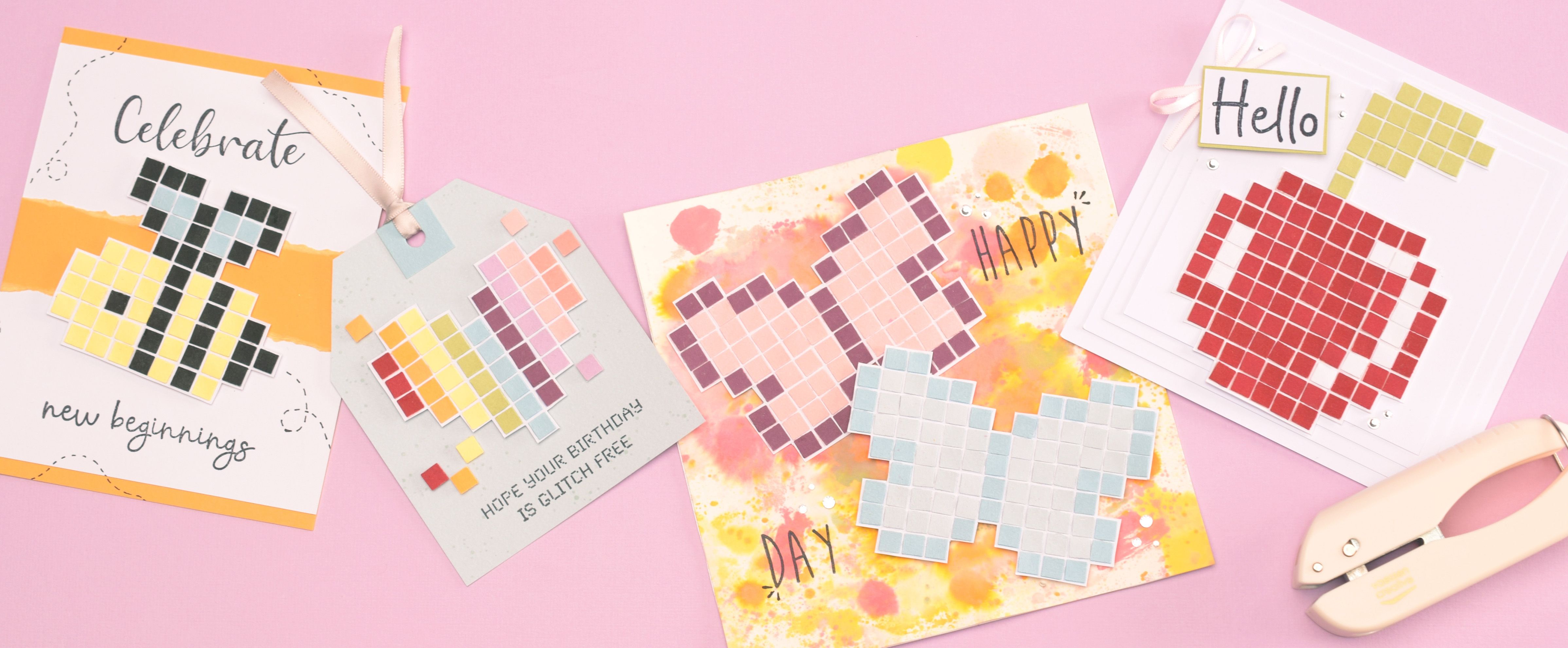 Biglietti pixel art realizzati con carta colorata