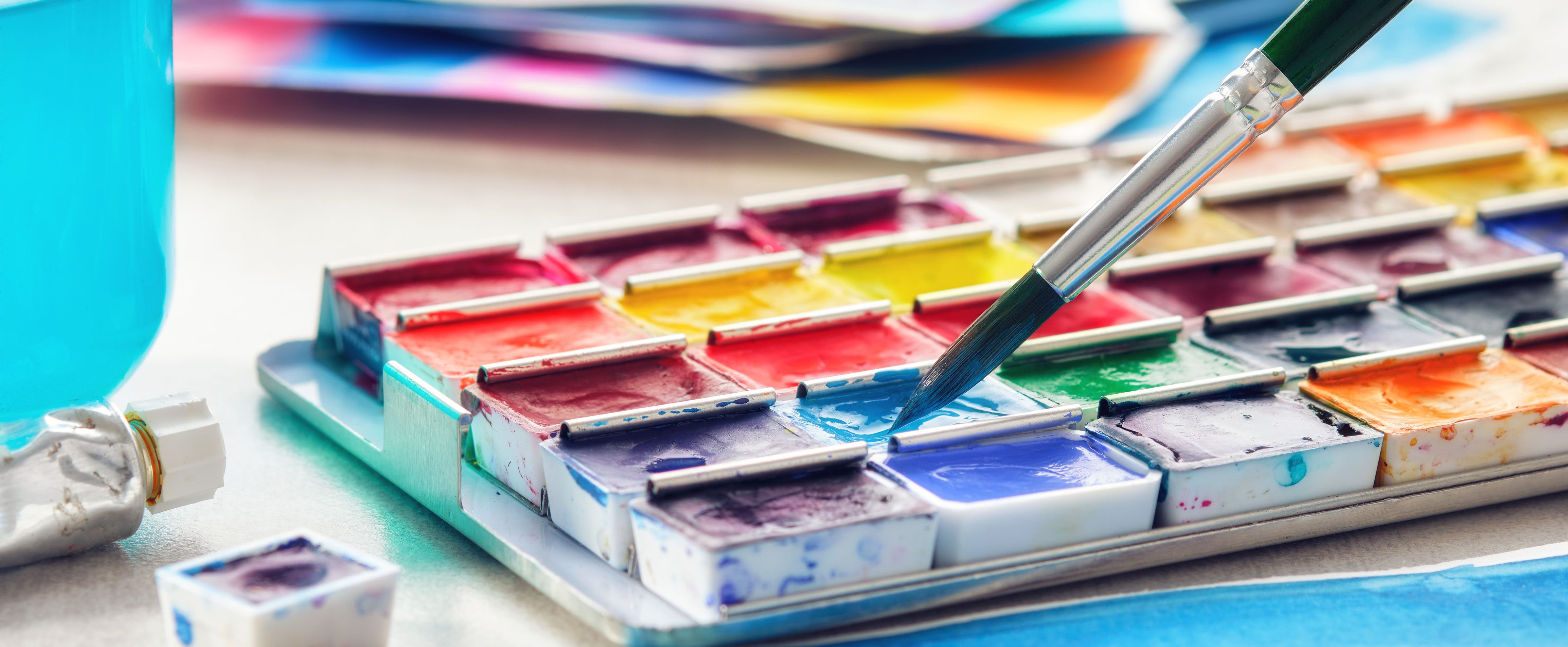 Watercolour paint and brush for colourful painting projects
