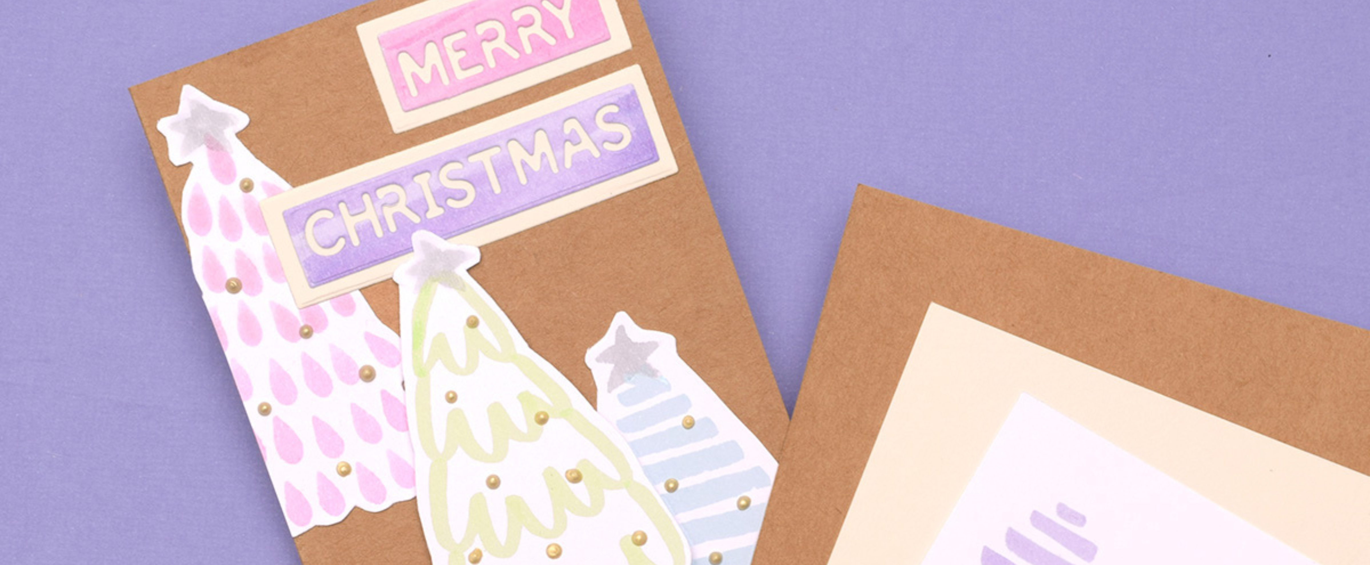 Pastel kerstkaart — zachte, moderne kerstkaart met minimalistische stijl.