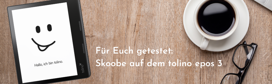 Der Tolino E-Reader zeigt einen Smiley neben einer Tasse Kaffee, einer Brille und einem Text über Skoobe auf dem Tolino Epos 3.