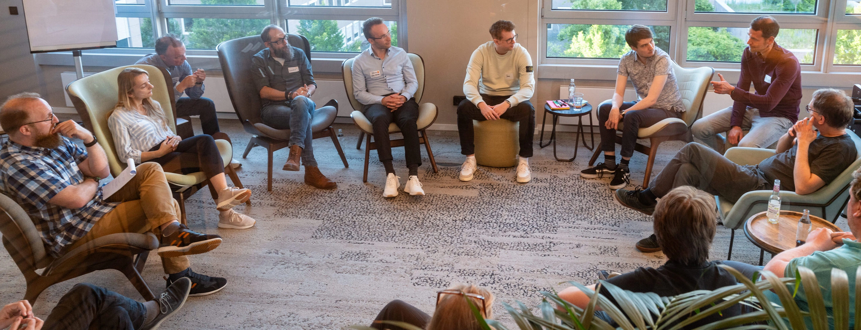 KI Use Case Workshop - Menschen im Stuhlkreis