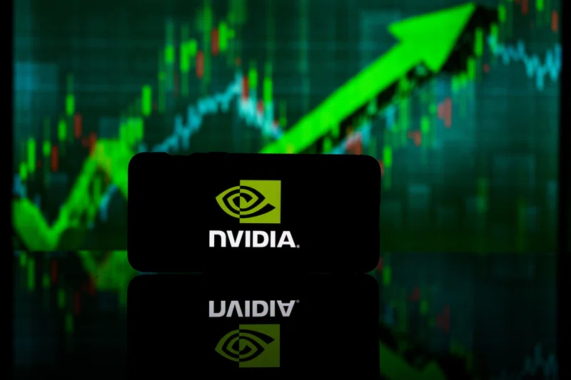Nvidia logo against market up arrow