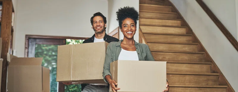 Couple with moving boxes