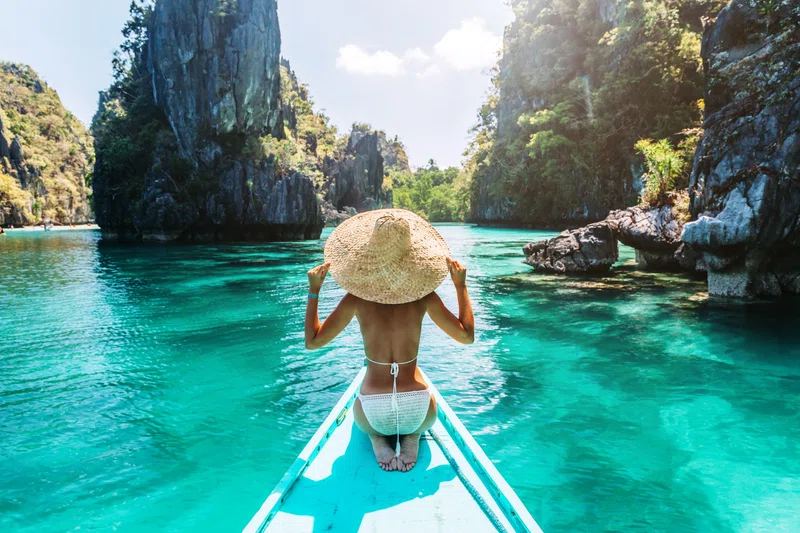 Woman on a boat in Asia