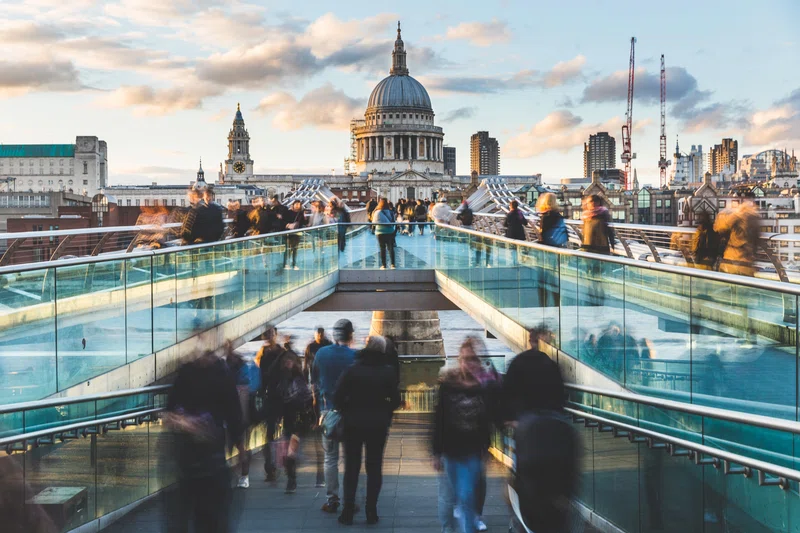 St Paul's Cathedral and people crossing wobbly bridge