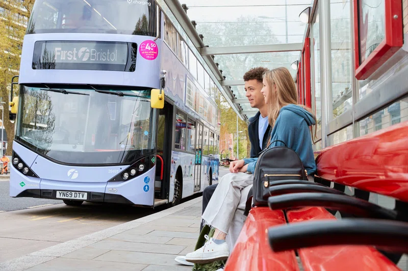 People waiting for a First Bus