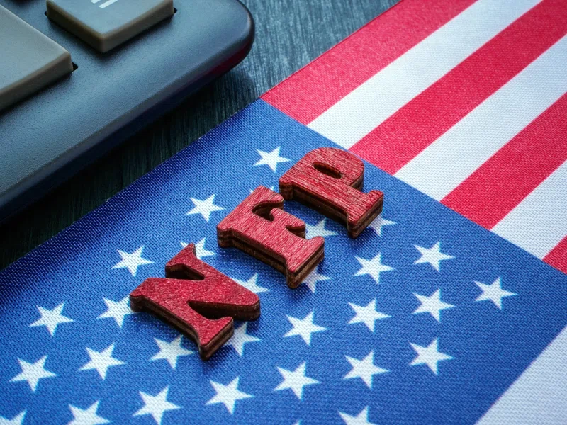 USA flag with non-farm payrolls letters