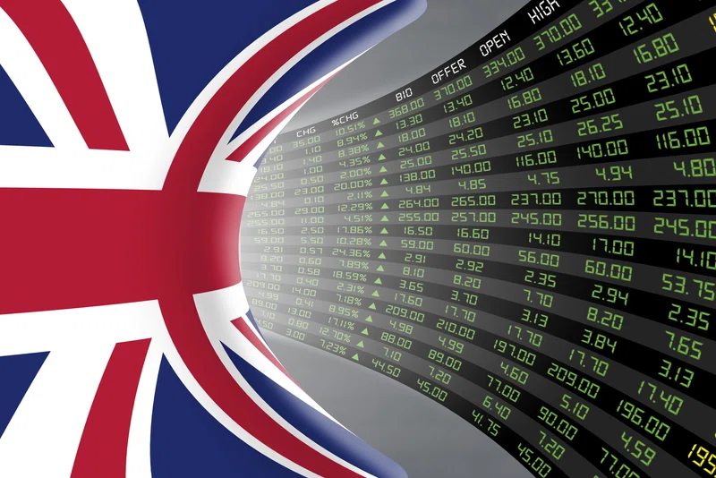 UK flag with rising stock prices