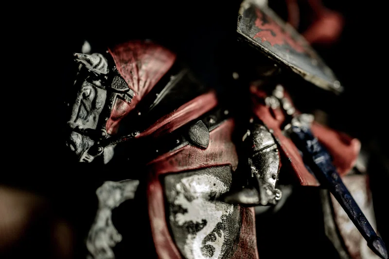 Armoured man on horse figurine