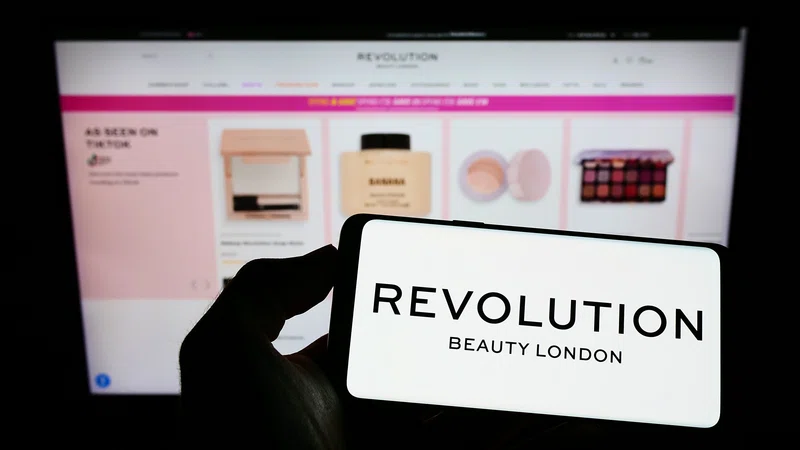 Revolution Beauty logo on smartphone