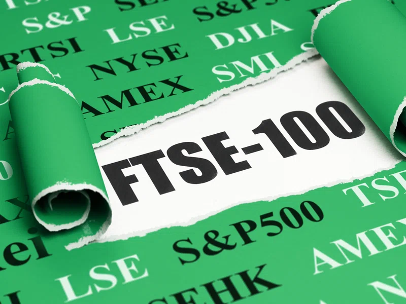 FTSE 100 under piece of torn paper
