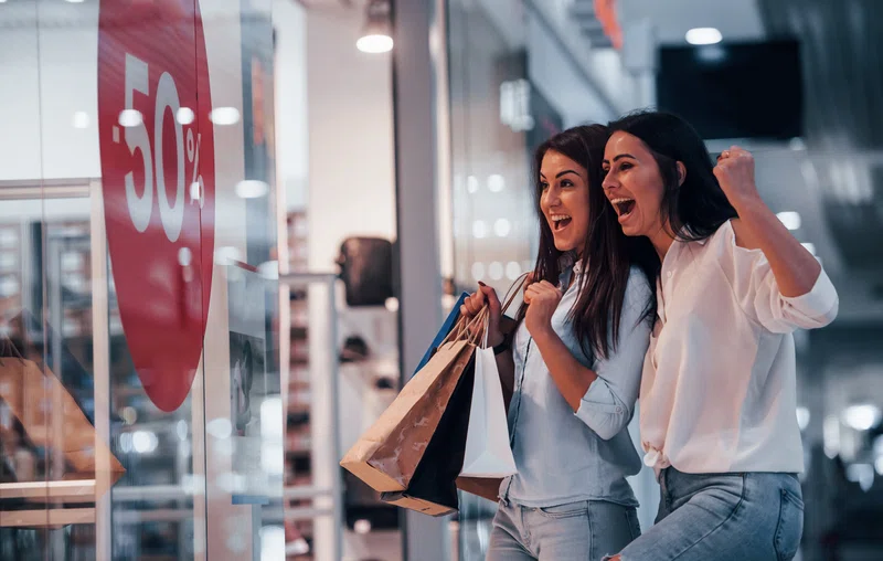 Shoppers celebrating sales