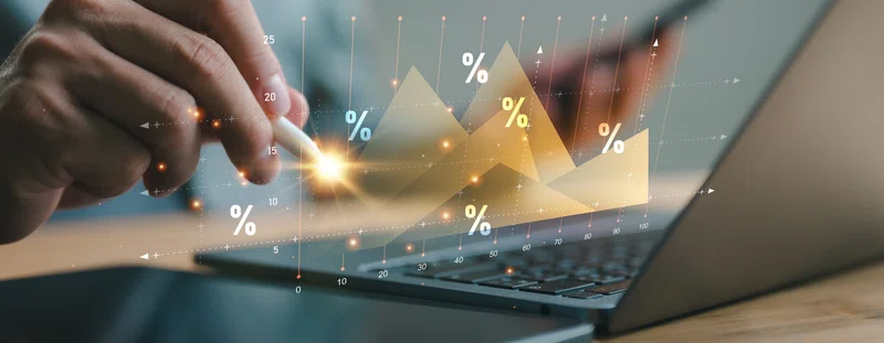 A person checking figures on a computer