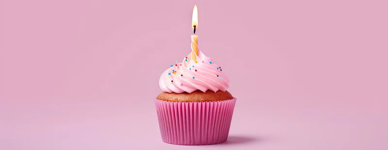 Pink cupcake with a candle 