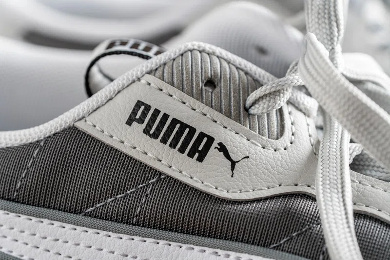 Close up of white Puma sneaker