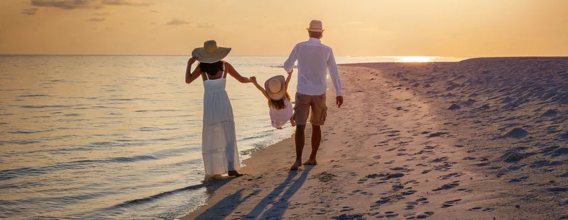 Couple walking along a Beach 