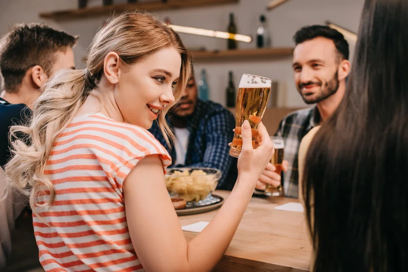 People drinking in a pub