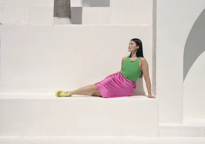 Model wearing brightly-coloured outfit from N Brown