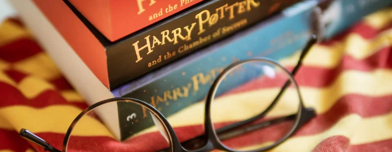 Harry Potter book and glasses