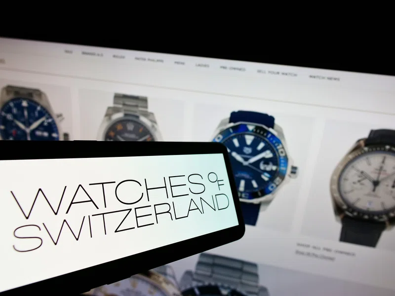 WOSG logo in front of watches on website