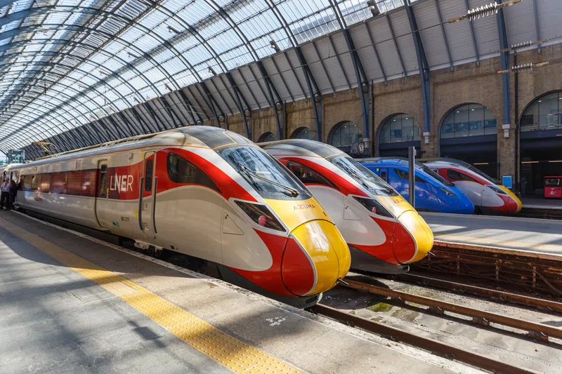 Azuma high speed trains of London North Eastern Railway LNER and Lumo of FirstGroup at King's Cross train station in London