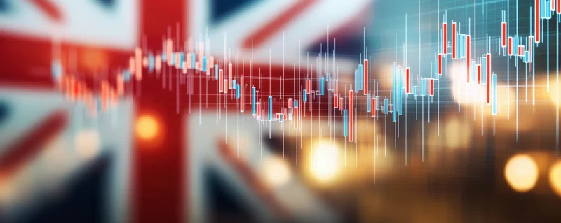 British flag superimposed on economic activity backdrop
