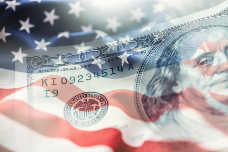 US flag and American dollars