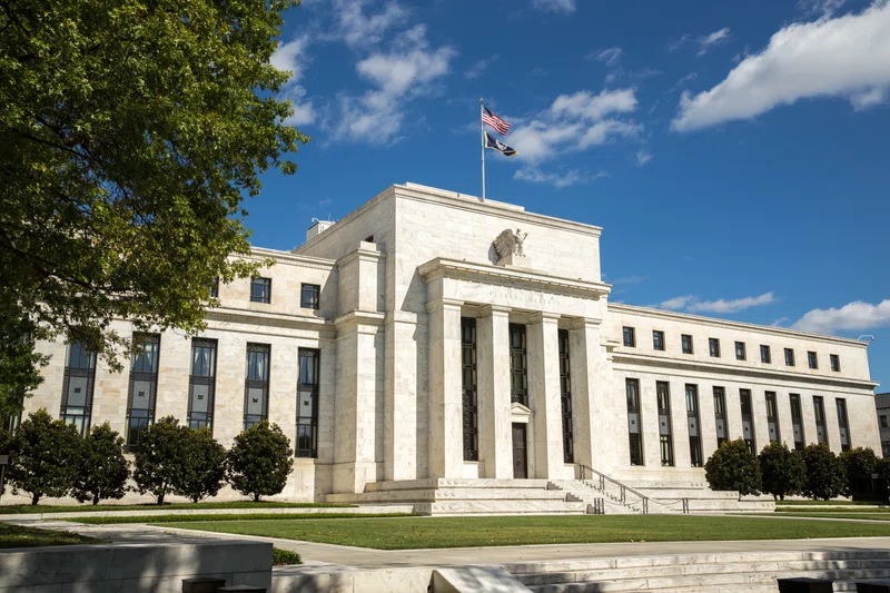 US Federal Reserve building against a blue sky