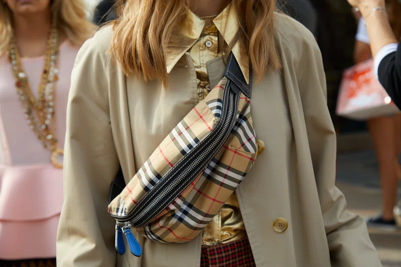 Lady wearing Burberry shoulder bag