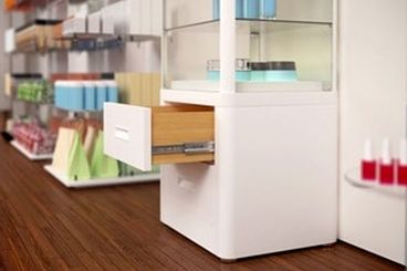 Retail glass cabinet with drawers at the bottom that are on Accuride slides.