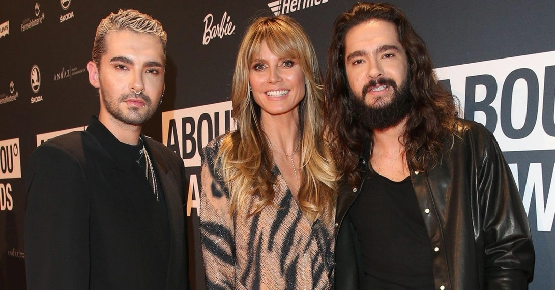 Bill (links) und Tom Kaulitz gemeinsam mit mit Kaulitz' späterer Ehefrau Heidi Klum bei den About You Awards im April 2019 (Foto: Gisela Schober/Getty Images für About You)