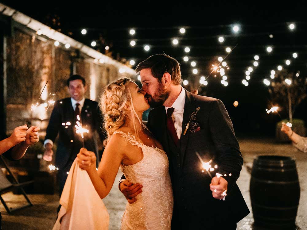 leanne and jack kiss with sparklers