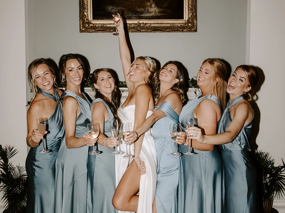 Pip and bridesmaids joyfully celebrate